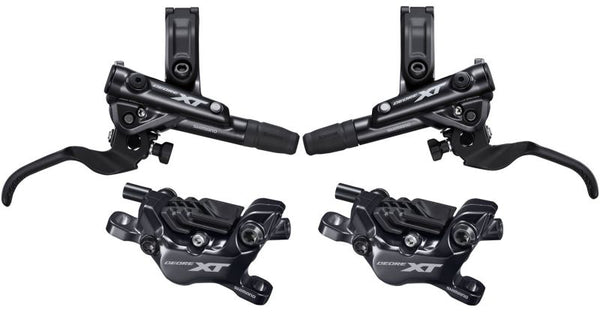 Set Freni Shimano XT M8120 a 4 pistoni, ideali per MTB ed e-bike. Offrono frenata potente e modulabile, garantendo sicurezza e precisione.